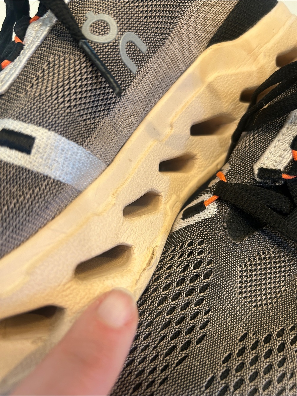 On Running Gray and Black Women's Running Sneakers with Orange Accents - Picture 5 of 6